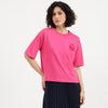 Women Round Neck Solid Plutch Logo T-Shirt