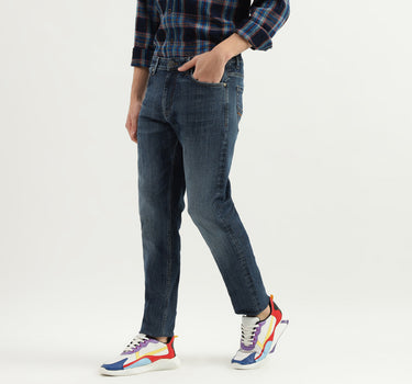 Solid Mid Rise Slim Tapered Fit Jeans